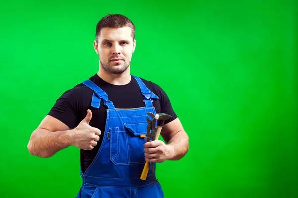 Homem Cabelos Escuros Construtor Uma Camiseta Preta Azul Construção Macacão — Fotografia de Stock