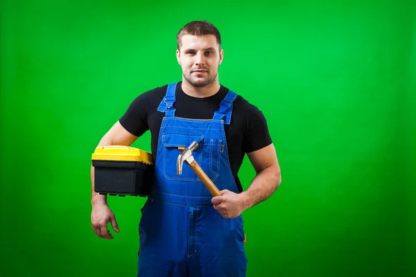 Trabalhador Construção Masculino Cabelos Escuros Uma Camiseta Preta Construção Azul — Fotografia de Stock