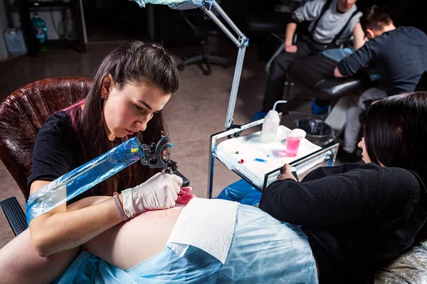 tattoo, woman, artist, professional, tattooist, girl, people, adult, fashion, lifestyle, master, culture, studio, beautiful, women, skin, ink, making, tattooing, black, background, closeup, white, female, getting, attractive, man, hand, drawing, work