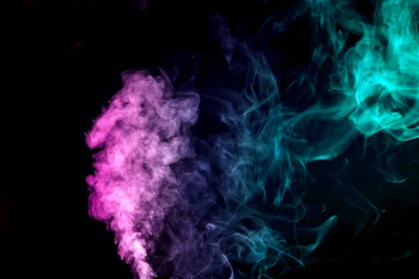 Cloud of smoke of purple, green, white colors on black  isolated background. Background from the smoke of vape