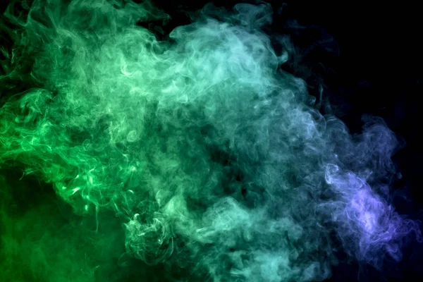 Cloud of smoke of blue and green colors on black  isolated background. Background from the smoke of vape