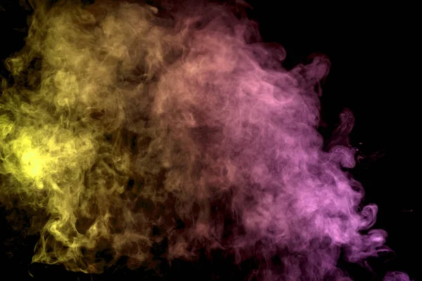 Colorful orange and pink smoke clouds on dark background.Background of smoke vape