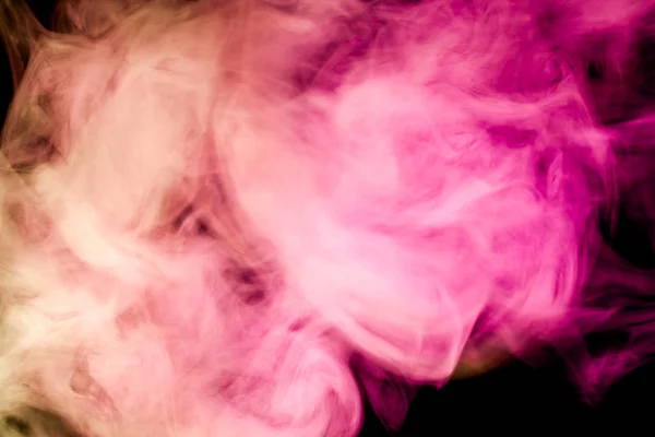 Colorful  pink and purple smoke  on a black isolated background. Background from the smoke of vape