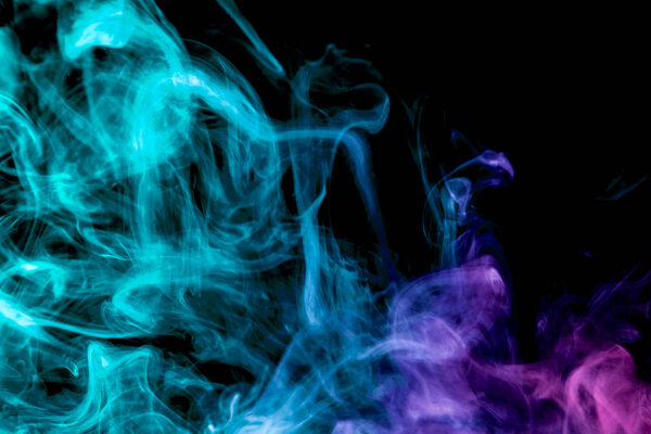 Blue and pink smoke on black background