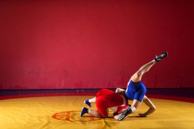 Two young man  wrestlers  clipart