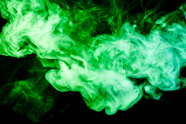 Dense multicolored pink and red smoke on a black isolated background. Background of smoke vape