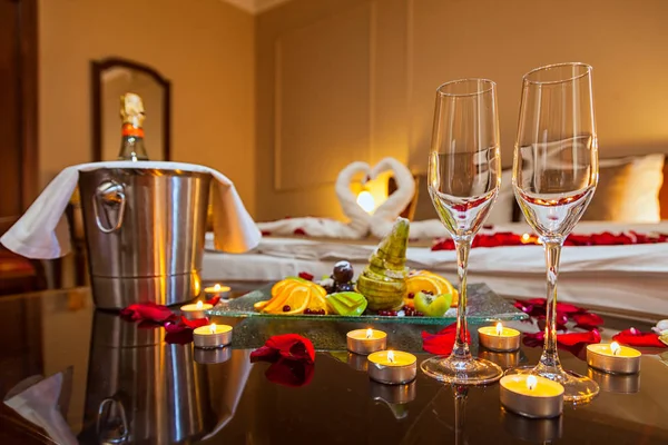 Hotel Room Honeymoon Table Fruit Plate Candles Background Bed Decorated Stock Image