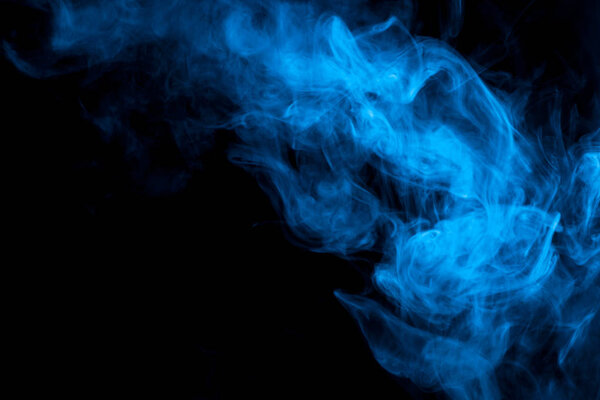 Blue smoke on black backgroun