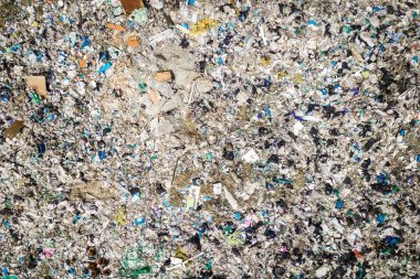 Aerial top view photo from flying drone of large garbage pile. Garbage pile in trash dump or landfill. Environmental pollution clipart