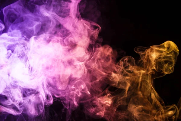 Pink, purple, orange smoke on black background