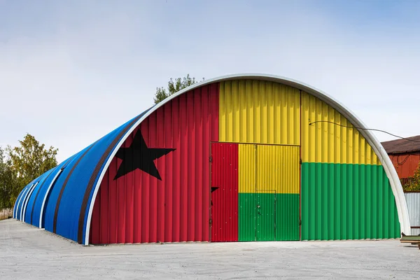 Close National Flag Guinea Bissau Painted Metal Wall Large Warehouse — Stock Photo, Image
