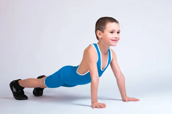 Portrait Little Cheerful Boy Blue Wrestling Tights Stands His Hands — Stock Photo, Image