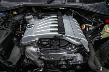Novosibirsk, Russia  October 13, 2019:  Volkswagen Touareg, Close up detail of  car engine, front view. Internal combustion engine, car parts, deteyling clipart