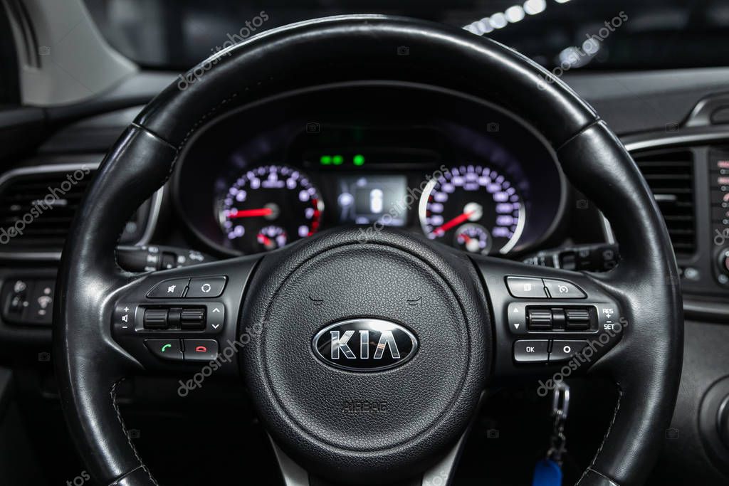 Novosibirsk, Russia  October 09, 2019:  Kia Sorento, new car Interior - dashboard, player, steering wheel with logo and buttons, speedometer and tachometer