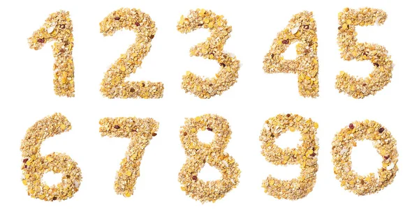 ココナッツ ベリー レーズン 穀物と白の隔離された背景に自然の穀物とMuesliからアラビア数字 グラノーラから作られた食品パターン デザインのための明るい数字は — ストック写真