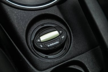 Novosibirsk, Russia  November 27, 2019:  Mitsubishi ASX,  close-up of the   webasto  setting buttons . modern car interior  clipart