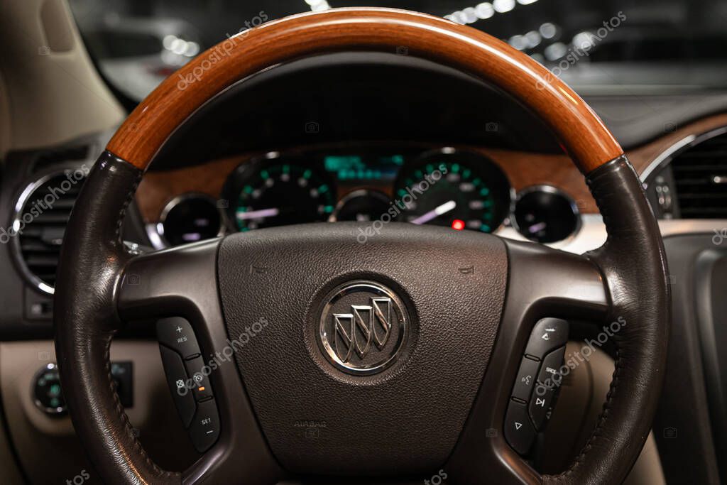 Novosibirsk, Russia  December 29, 2019:   Buick Enclave, close-up of the dashboard, speedometer, tachometer and steering wheel. . modern car interior