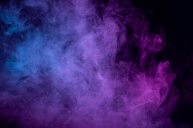 Pattern, Neon purple    and   blue smoke in the  on a dark isolated background. Background from the smoke of vape