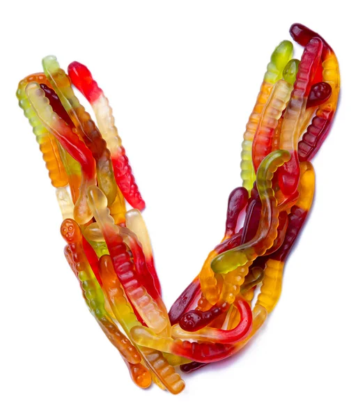 Food pattern made ffrom children's sweets snakes — Stock Photo, Image