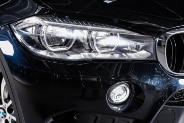 Novosibirsk, Russia  February 12, 2020: BMW X6, Detail light close up of on new car. Exterior detail  