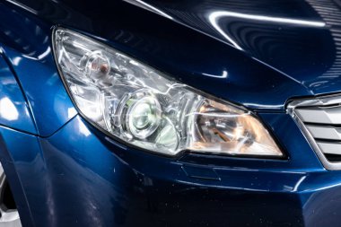 Novosibirsk, Russia  December 29, 2019:  Subaru Outback, Detail light close up of on new car. Exterior detail  