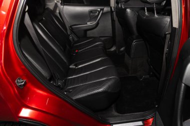 Novosibirsk, Russia  January 05, 2020:  Nissan Murano, Rear seat for passengers in black leather, open door to the passenger compartment