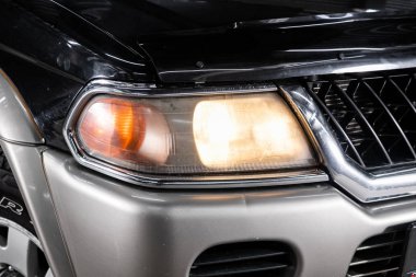 Novosibirsk, Russia  January 15, 2020:   Mitsubishi Montero Sport, Detail light close up of on new car. Exterior detail  