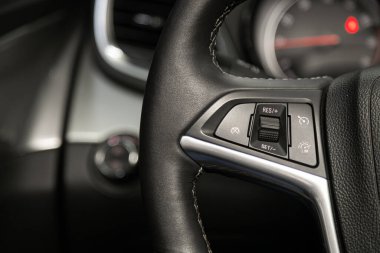Novosibirsk, Russia  January 11, 2020:   Opel Mokka, New black steering wheel with multifunction buttons for quick control phone, music and other function
