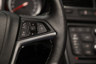 Novosibirsk, Russia  January 11, 2020:   Opel Mokka, New black steering wheel with multifunction buttons for quick control phone, music and other function