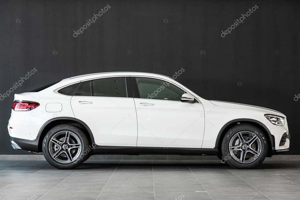 Novosibirsk, Russia  March 06, 2020:   new white Mercedes-Benz  GLC-Class,   side view.   Luxury  crossover made in Germany on a parking in Novosibirsk
