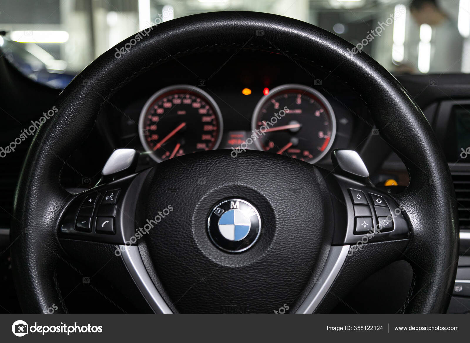 https://st3.depositphotos.com/11618586/35812/i/1600/depositphotos_358122124-stock-photo-bmw-dashboard-player-steering-wheel.jpg