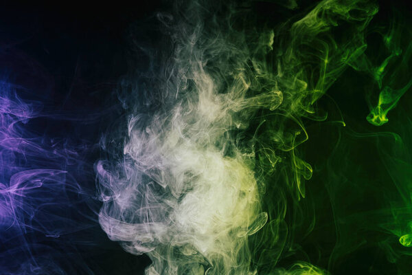 Pattern, Neon green and blue smoke in the on a dark isolated background. Background from the smoke of vap