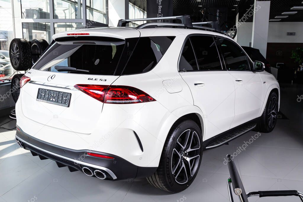 Novosibirsk/ Russia  April 06, 2020:  Mercedes-Benz GLE mid-range luxury SUV, back view. New expensive  modern  sedan  on a parking on  white background