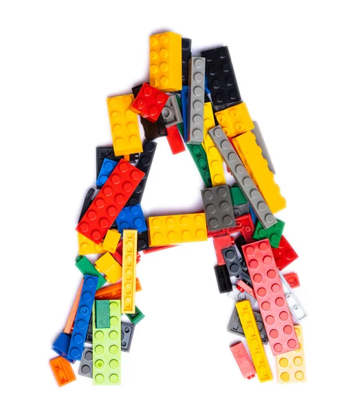 Letra Del Alfabeto Inglés Constructor Plástico Infantil Multicolor Sobre Fondo —  Fotos de Stock