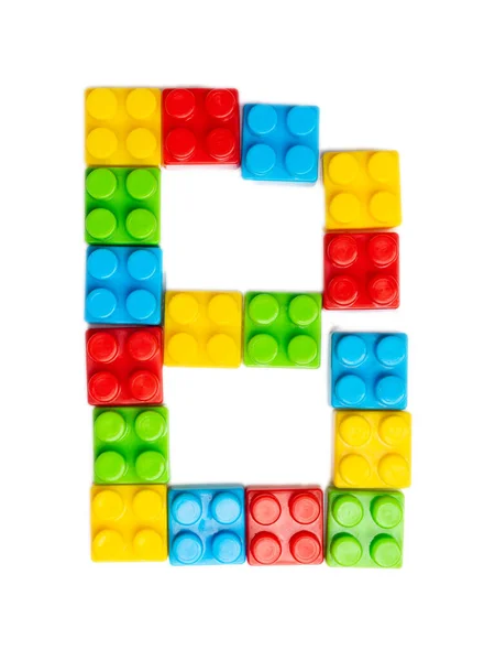 Letter B of the English alphabet  from multi-colored children\'s plastic constructor on a white isolated background.  Bright alphabet for kids design