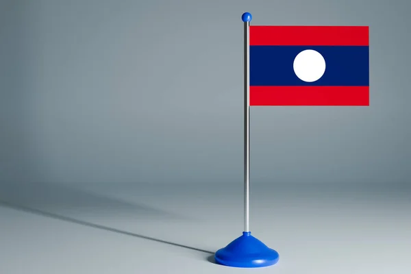 Die Darstellung Der Nationalflagge Von Laos Auf Stahlpfahl Auf Grauem — Stockfoto