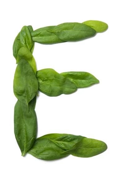 Buchstabe Des Englischen Alphabets Aus Frischen Grünen Spinatblättern Auf Weißem — Stockfoto