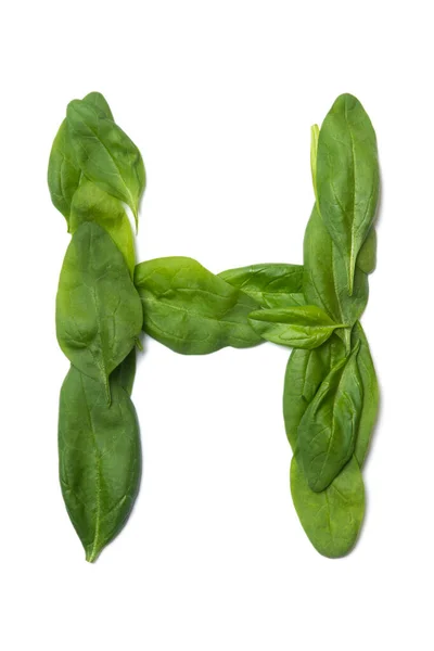 Buchstabe Des Englischen Alphabets Aus Frischen Grünen Spinatblättern Auf Weißem — Stockfoto