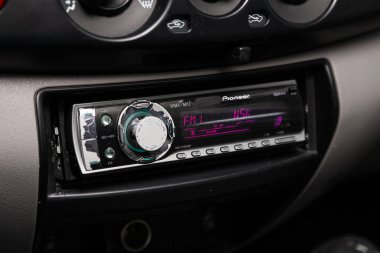 Novosibirsk/ Russia  April 02, 2020  Mitsubishi L200 , close-up of the black panel with radio,  player and control buttons  clipart
