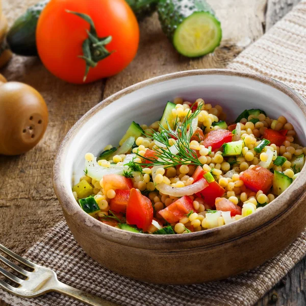 Israeli couscous Ptitim with vegetables Royalty Free Stock Images