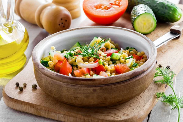 Israeli couscous Ptitim with vegetables Royalty Free Stock Photos
