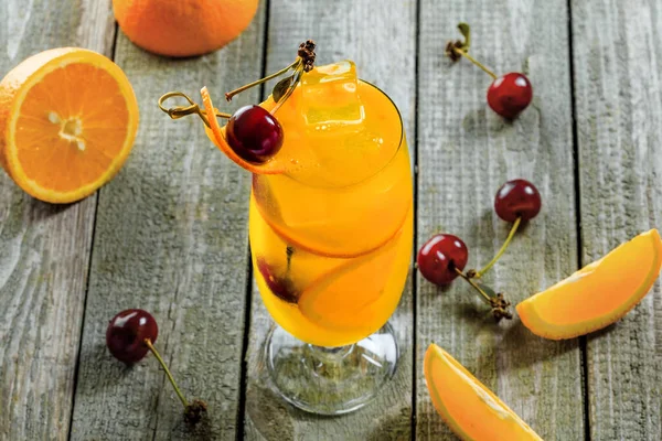 Fruit Punch Cocktail Made Vodka Fruit Juice Orange Cherry Wooden — Stock Photo, Image