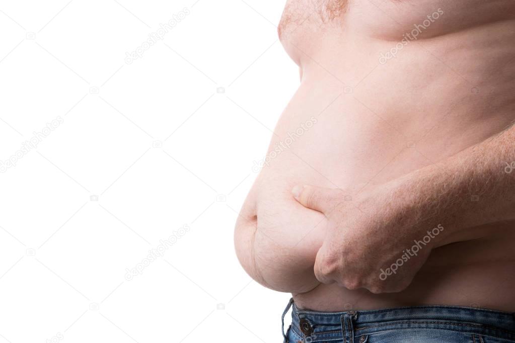 Overweight man shows his fat folds