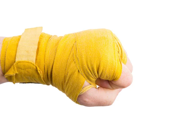 Boxare näve i misshandlade gult bandage, power koncept — Stockfoto