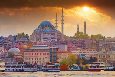 Dramatic sunset over Suleymaniye Mosque in Istanbul, Turkey   clipart