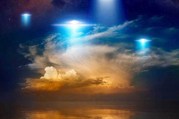 Extraterrestrial aliens spaceships, ufo in red glowing sky — Stock Photo, Image