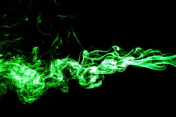 Green colored smoke on a black background. — Stock Photo, Image