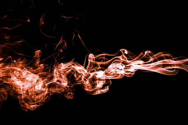 Abstract color smoke on black background, orange smoke background,orange ink background,orange smoke,Orange Smoke Abstract Wallpaper or Background ,fire and smoke isolated on black. Beautiful background