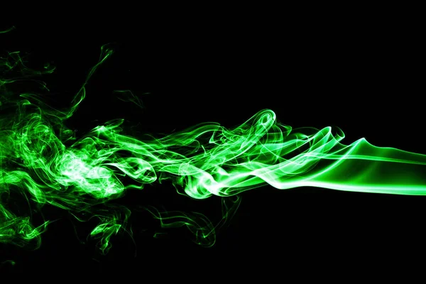 Green colored smoke on a black background. — Stock Photo, Image