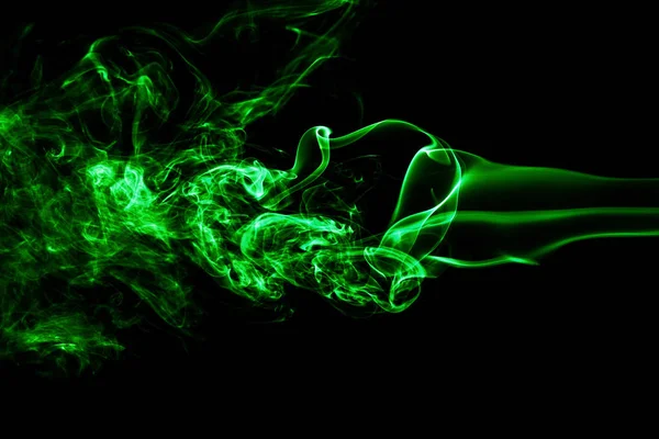 Green colored smoke on a black background. — Stock Photo, Image